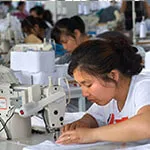 sewing-worshop Sewing workshop with workers at machines
