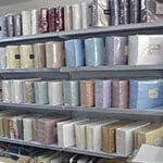 ready-made-bedding linens Shelves of ready made bedding fabrics