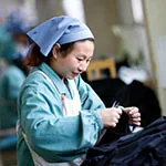 thread-cutting inspection Worker performing thread cutting and inspection