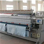 Multi needle quilting machine at work